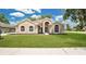 Charming single-story home with a well-manicured lawn and classic architectural details at 101 Majestic Forest Run, Sanford, FL 32771