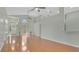 Bright and open living room featuring high ceilings, hardwood floors, and a large window at 101 Majestic Forest Run, Sanford, FL 32771