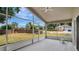 Relax in the screened porch overlooking the landscaped backyard at 101 Majestic Forest Run, Sanford, FL 32771