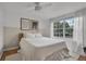 Cozy bedroom with large window offering lots of natural light, and modern decor at 1012 N Shine Ave, Orlando, FL 32803