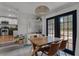 Cozy dining area featuring stylish chairs, lots of natural light, and convenient access to kitchen at 1012 N Shine Ave, Orlando, FL 32803