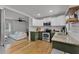 Open-concept kitchen with stainless steel appliances that opens to living space, perfect for entertaining at 1012 N Shine Ave, Orlando, FL 32803