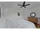 Bright main bedroom with hardwood floors, fresh white walls and lots of closet space at 1012 N Shine Ave, Orlando, FL 32803