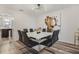 Well-lit dining room featuring a modern chandelier and seating for eight at 102 Royalty Cir, Sanford, FL 32771