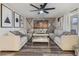 Bright living room featuring modern decor and wood flooring at 102 Royalty Cir, Sanford, FL 32771