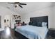 Main bedroom featuring a work station and dark wood flooring at 102 Royalty Cir, Sanford, FL 32771