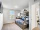 This bedroom offers a bunk bed and TV at 1067 Plantation Ln, Davenport, FL 33896