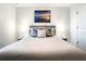 This bedroom offers a comfortable bed, stylish decor, and plenty of natural light at 1067 Plantation Ln, Davenport, FL 33896