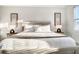 Bright bedroom featuring a large comfortable bed and stylish wall art at 1067 Plantation Ln, Davenport, FL 33896