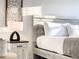 Bedroom with bedside table and rustic decor at 1067 Plantation Ln, Davenport, FL 33896