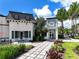 Festival Square's charming exteriors feature well-maintained landscaping and stylish architectural details at 1067 Plantation Ln, Davenport, FL 33896