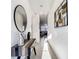 Bright foyer showcases tile flooring, modern decor, console table with decorative accessories, and ample lighting at 1067 Plantation Ln, Davenport, FL 33896
