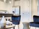 Stylish living area showcasing a modern design, including a sleek island, and decorative furniture at 1067 Plantation Ln, Davenport, FL 33896