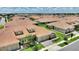 An aerial view of single Gathering homes shows beautiful tile roofs and manicured lawns in a vibrant neighborhood at 1082 Blackwolf Run Rd, Davenport, FL 33896