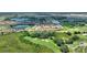 Beautiful aerial view of the community near golf course with ponds at 1082 Blackwolf Run Rd, Davenport, FL 33896