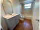 The bathroom features a single sink vanity, toilet, and shower-tub combination with a neutral color palette at 116 Talavera Ln, Kissimmee, FL 34758