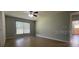 Cozy bedroom with neutral walls, a ceiling fan, and natural light at 116 Talavera Ln, Kissimmee, FL 34758