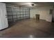 Spacious garage with concrete floor, garage door, and ample space for parking and storage at 116 Talavera Ln, Kissimmee, FL 34758