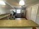 Functional kitchen with light-colored cabinets and plenty of counter space at 116 Talavera Ln, Kissimmee, FL 34758