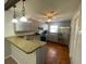 Well-equipped kitchen featuring bar seating, stainless steel appliances, and ample storage space at 116 Talavera Ln, Kissimmee, FL 34758