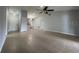 Open-concept living space with tile floors and access to the kitchen at 116 Talavera Ln, Kissimmee, FL 34758