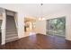 Open dining area with backyard access and stairs to the second level at 120 W Minnehaha Ave, Clermont, FL 34711