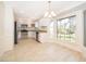 Bright eat-in kitchen featuring stainless steel appliances, and tile floors at 120 W Minnehaha Ave, Clermont, FL 34711
