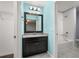 Bathroom with granite sink, bathtub and hardwood floor at 14160 Dove Hollow Dr, Orlando, FL 32824
