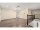 Upstairs living room featuring wood floors and a ceiling fan at 14160 Dove Hollow Dr, Orlando, FL 32824