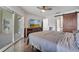 Relaxing main bedroom featuring sliding glass doors and an ensuite bathroom at 149 Imperial Oak Ct, Davenport, FL 33896