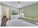 Shared bedroom featuring twin beds, natural light, and ample storage space at 149 Imperial Oak Ct, Davenport, FL 33896
