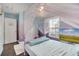 Stylish bedroom featuring a canopy bed, soft lighting, and ample closet space at 149 Imperial Oak Ct, Davenport, FL 33896