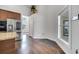 Spacious dining area features hardwood floors, a view of the front yard, and easy kitchen access at 149 Imperial Oak Ct, Davenport, FL 33896