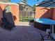 Enclosed patio features brick pavers, lounge chair, and spa at 153 Pompano Beach Dr Dr, Kissimmee, FL 34746