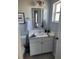Contemporary bathroom featuring a vanity, stylish mirror, and modern fixtures at 153 Pompano Beach Dr Dr, Kissimmee, FL 34746