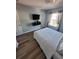 Well-lit bedroom featuring contemporary furniture and a bright, airy ambiance at 153 Pompano Beach Dr Dr, Kissimmee, FL 34746