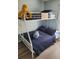Stylish bunk bed setup featuring a comfortable bunkbed with cozy bedding and a playful aesthetic at 153 Pompano Beach Dr Dr, Kissimmee, FL 34746