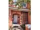 Charming two-story townhouse featuring a welcoming walkway and decorative accents at 153 Pompano Beach Dr Dr, Kissimmee, FL 34746