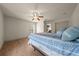 Bright bedroom with hardwood floors, ceiling fan, window, and ample space offers comfort and style at 1654 Marina Lake Dr, Kissimmee, FL 34744