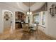 Charming breakfast nook with decorative chandelier and outdoor view at 1654 Marina Lake Dr, Kissimmee, FL 34744