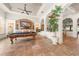 Game room with a pool table, neutral walls, tile flooring, arched windows and recessed lighting at 1654 Marina Lake Dr, Kissimmee, FL 34744