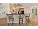 The kitchen has a large island with seating, stainless steel appliances, and an open concept design at 1654 Marina Lake Dr, Kissimmee, FL 34744