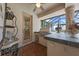Inviting outdoor kitchen with a built-in grill and ample counter space at 1654 Marina Lake Dr, Kissimmee, FL 34744