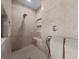 View of a tiled shower with built-in bench and shelving, and sleek fixtures at 1654 Marina Lake Dr, Kissimmee, FL 34744