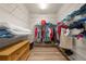 Spacious walk-in closet with ample shelving and storage, providing organized space for clothing and accessories at 1654 Marina Lake Dr, Kissimmee, FL 34744