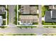 Aerial view of home showing roof top, yard, and landscaping at 1850 Treasure Cv, Celebration, FL 34747