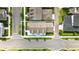 Aerial view of home showing property lines, roof, and landscaping at 1850 Treasure Cv, Celebration, FL 34747