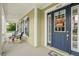 Cozy front porch featuring comfortable seating and a decorative wreath at 1850 Treasure Cv, Celebration, FL 34747