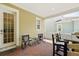 Outdoor patio with brick flooring, seating area, and door to enter the home at 1850 Treasure Cv, Celebration, FL 34747