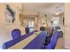 Stylish dining room with staircase view and open floor plan at 214 Tupelo Cir, Davenport, FL 33897